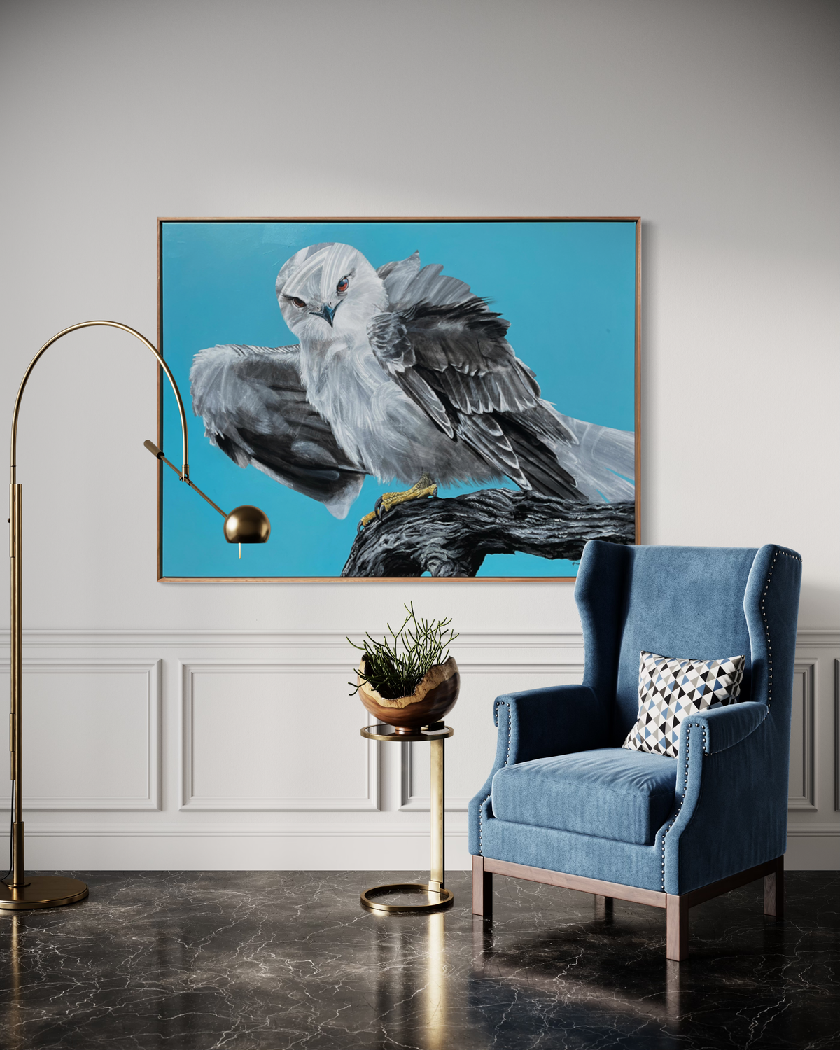 Photo of Geoffrey Carran&#39;s Painting of a Black Shouldered Kite hanging on the wall behind stylish furniture, an occasional chair and modern freestanding lamp